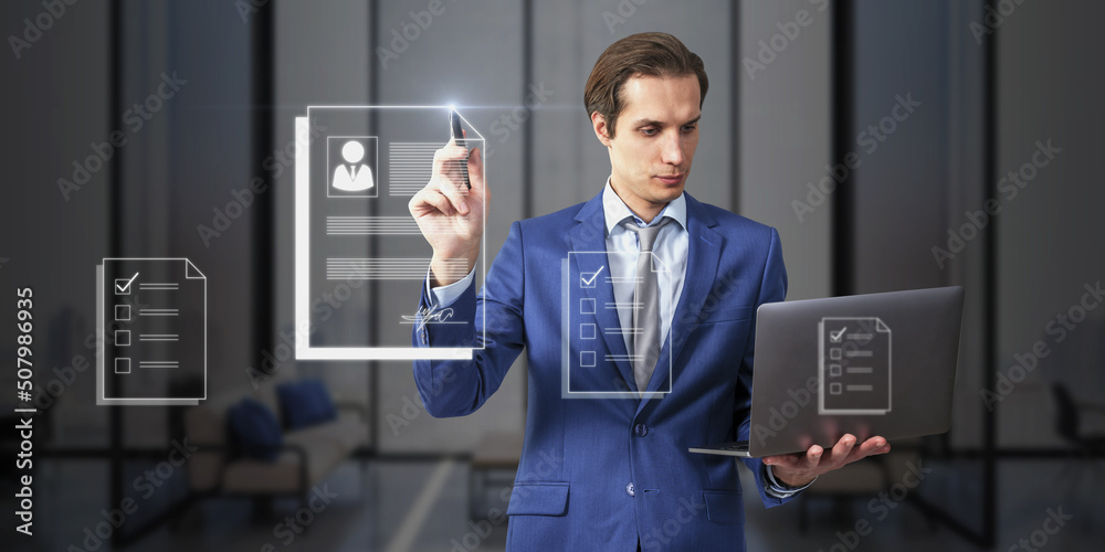 Poster attractive young european businessman with laptop using abstract digital documentation hologram on b