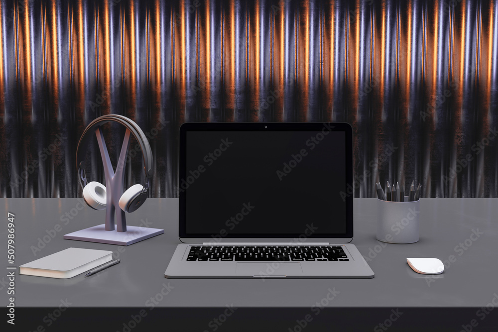 Poster close up of modern designer desktop with empty black laptop screen with headset, pencils and other i