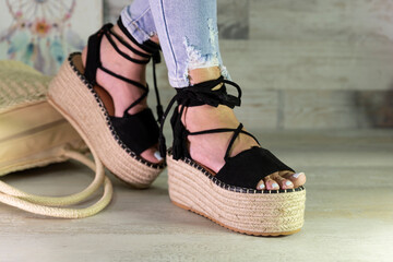 Summer sandals on a womans feet. Beauty fashion styling