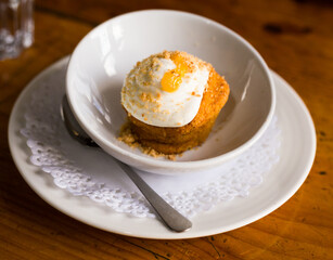 Delicious dessert - carrot cake with orange crumbs clos eup