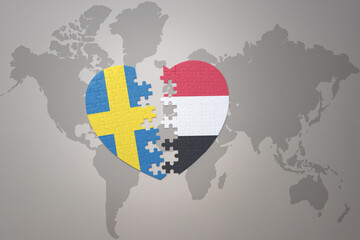 puzzle heart with the national flag of sweden and yemen on a world map background. Concept.