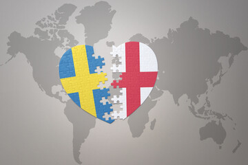 puzzle heart with the national flag of sweden and england on a world map background. Concept.