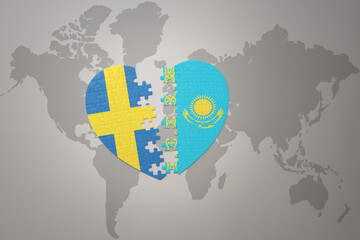 puzzle heart with the national flag of sweden and kazakhstan on a world map background. Concept.