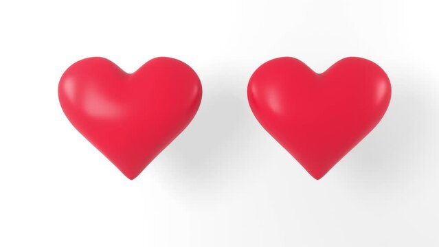 Two red hearts pulsate on a white background. Love, reciprocity concept.