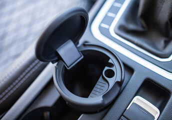 Modern ashtray for cigarettes, close-up. Smoking in the car