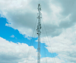 scaffolding with antennas on a blue background