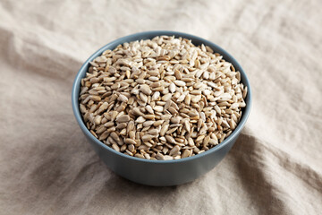 Raw Organic Sunflower Seed Kernels in a Bowl, side view.
