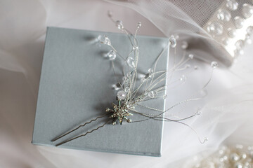 Wedding pearl hair clip on a box. Top view