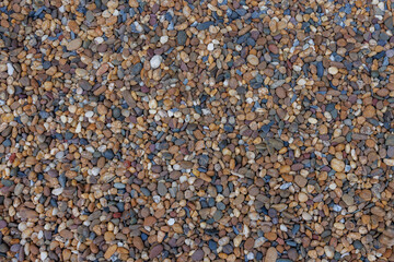 Brown gravel textured background. Abstract nature rock pattern surface concept.