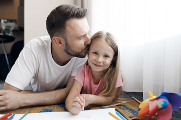 father and his daughter at home