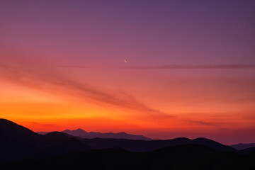 Scenic view of the mountains during sunrise