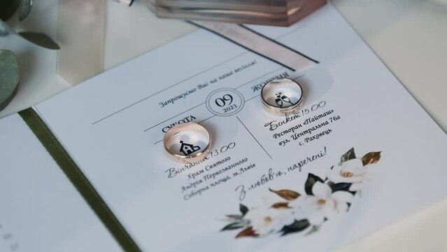 Wedding rings with beautiful light of a happy young couple