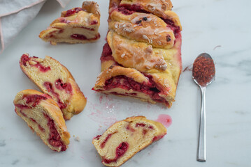 sweet home made saffron babka brioche with raspberries