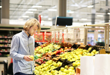 Man buying fruits at the market