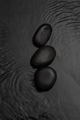 black stones with water Waves
