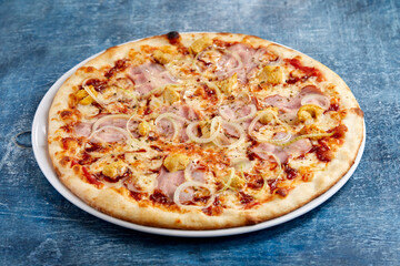 tasty italian pizza on wooden background
