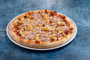 tasty italian pizza on wooden background