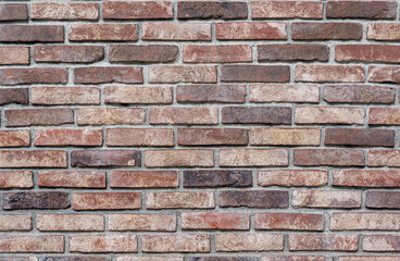 Background of rustic sandblasted bricks wall, sandblasted bricks textures.