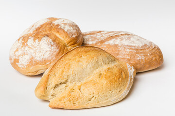 Homemade natural breads. Different kinds of fresh bread as background, perspective view with copy space