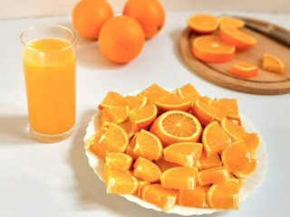 freshly squeezed orange juice and sliced oranges