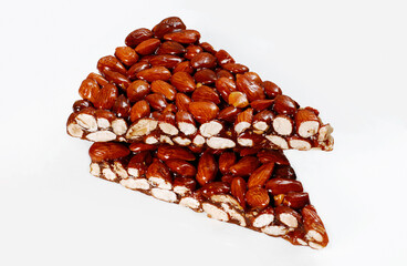 Caramelized peanut cookie cake on white background.