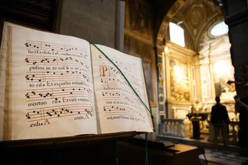 Foto op Plexiglas Vintage book for music in the catholic church © tsezarina