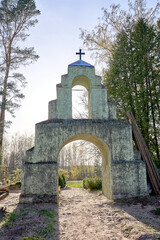 Fototapeta na wymiar Old historical bell tower in Hercogu kapi cemetery in Latvia.