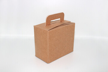 Brown box with a top handle, back