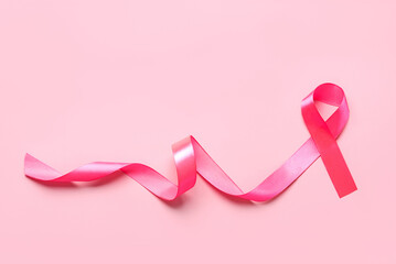 Top view of pink ribbon symbol breast cancer awareness with space for text