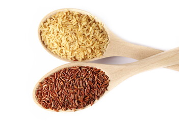 Uncooked red wild rice and integral rice pile in wooden spoon isolated on white, top view