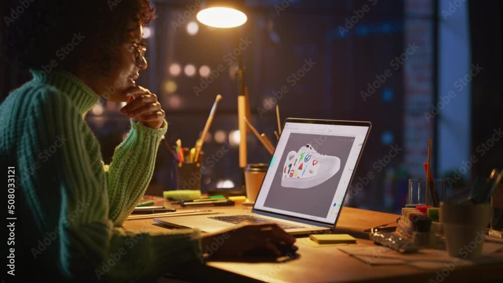 Poster latin female art director examining 3d model of shoe while working at desktop computer at home. arti