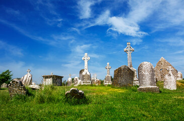 Clonmacnoise Cathedral with the typical crosses and graves