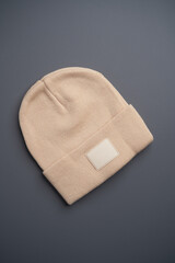 Wool hat on gray background with copy space