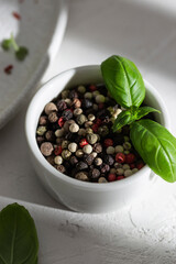 Bowl of black pepper on a table