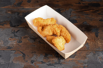 shrimp fries, crispy shrimp, shrimp on a wooden background