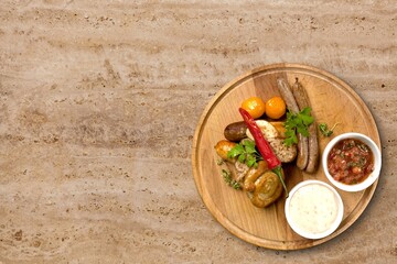 Appetizers with different, charcuterie,  sausage, meat and sauce. Top view, flat lay