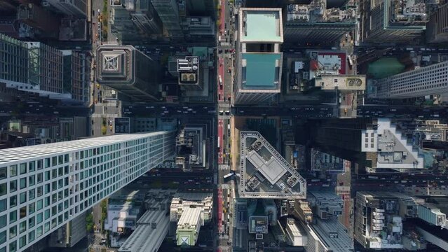 Aerial birds eye overhead top down view of high rise midtown buildings. Amazing view of city from height. Manhattan, New York City, USA