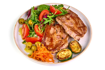 Grilled pork shoulder steak with vegetable salad, isolated on white background.