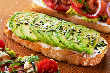 Fresh toast with avocado and sesame