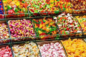 Close-up of colorful sweets and jellies at a market stall.Various gelatin.