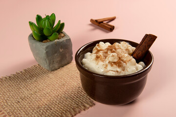 traditional sweet from the Brazilian June festivals, made of white corn with coconut and condensed milk and sprinkled with cinnamon