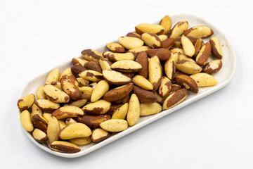 Brazil walnut on white background. Close-up brazil walnut kernel