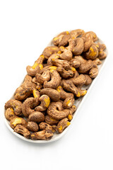 Shelled cashew on white background. Close-up of fresh cashews