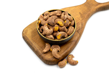Shelled cashew on white background. Close-up of fresh cashews
