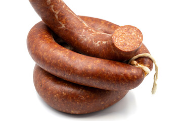 Sausage on a white background. Close-up spicy Turkish sausage