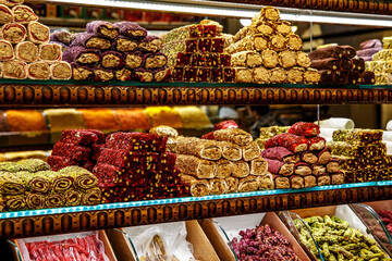 Traditional Turkish delights sweet rolls, Oriental sweets lukum, lokum, nougat.