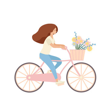 Girl with long hair riding a bicycle with basket and flowers
