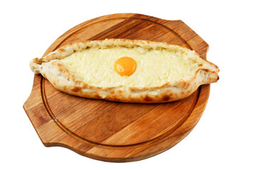 Khachapuri with egg on a wooden board. Traditional dish of Georgian cuisine. Isolated on white background.