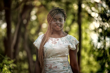 Beauty black skin woman African Ethnic female face. Young african american model with long afro hair.