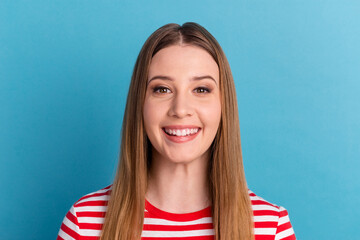 Fototapeta premium Photo of young cheerful girl toothy smile visit dentist cavity protection clinic isolated over blue color background